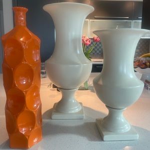 Decorative orange and cream vases